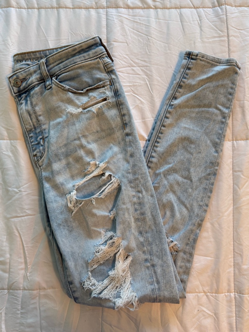 American Eagle Ripped Next Level Stretch Jeans